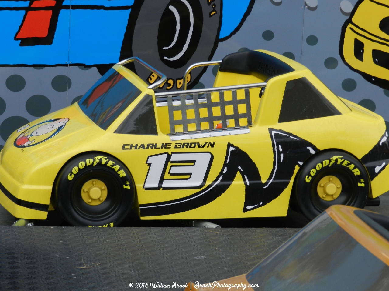 Yellow #13 car diven by Charlie Brown.