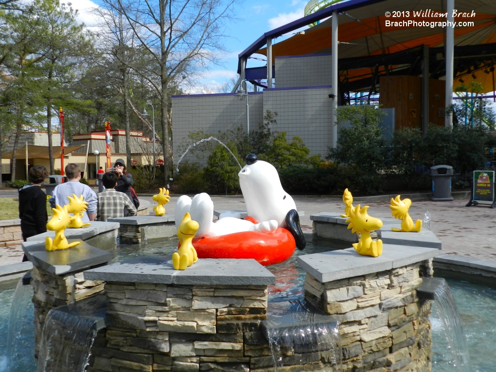 Snoopy shooting water out of his mouth.