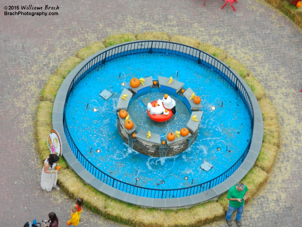 The fountain with hay bales all around it (and a fence?!) for kids to pick pumpkins from.