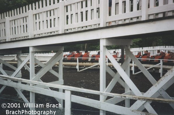 Red train enroute to the lift hill.