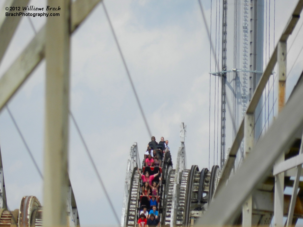 Riders going over a hill on Rebel Yell.