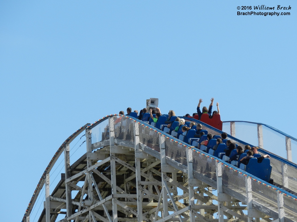 North (Blue) and South (Red) trains on the Rebel Yell cresting the lift hill.