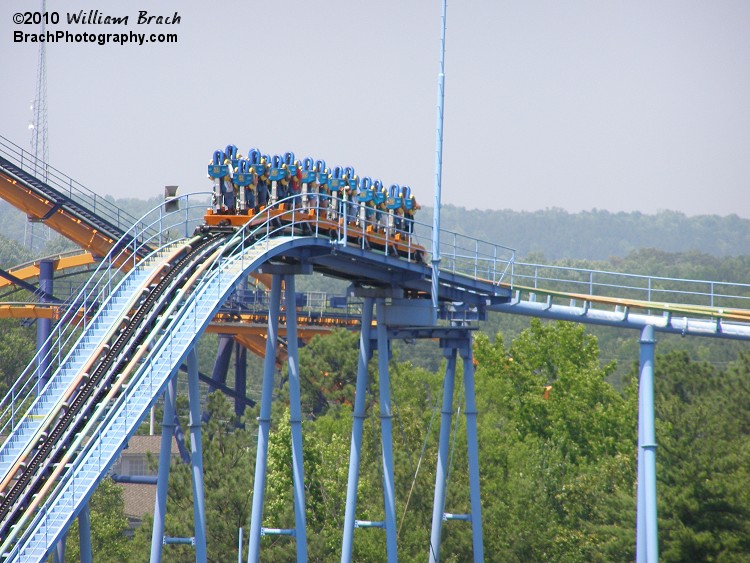 Train reaching the top of the hill.