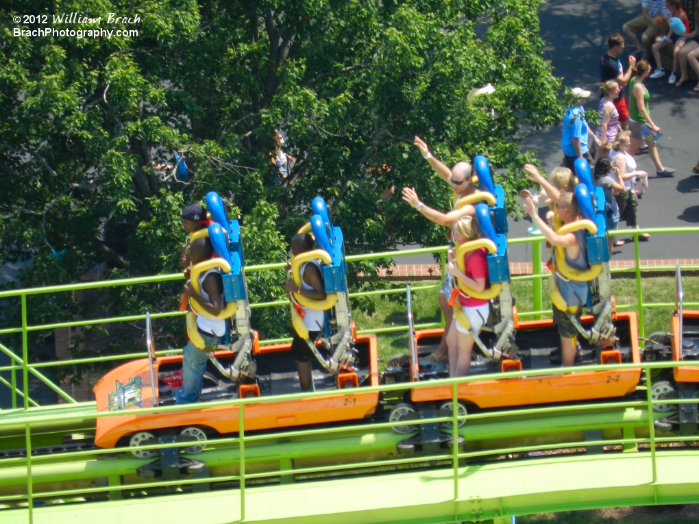 Riders getting ready to take a spin on Shockwave.