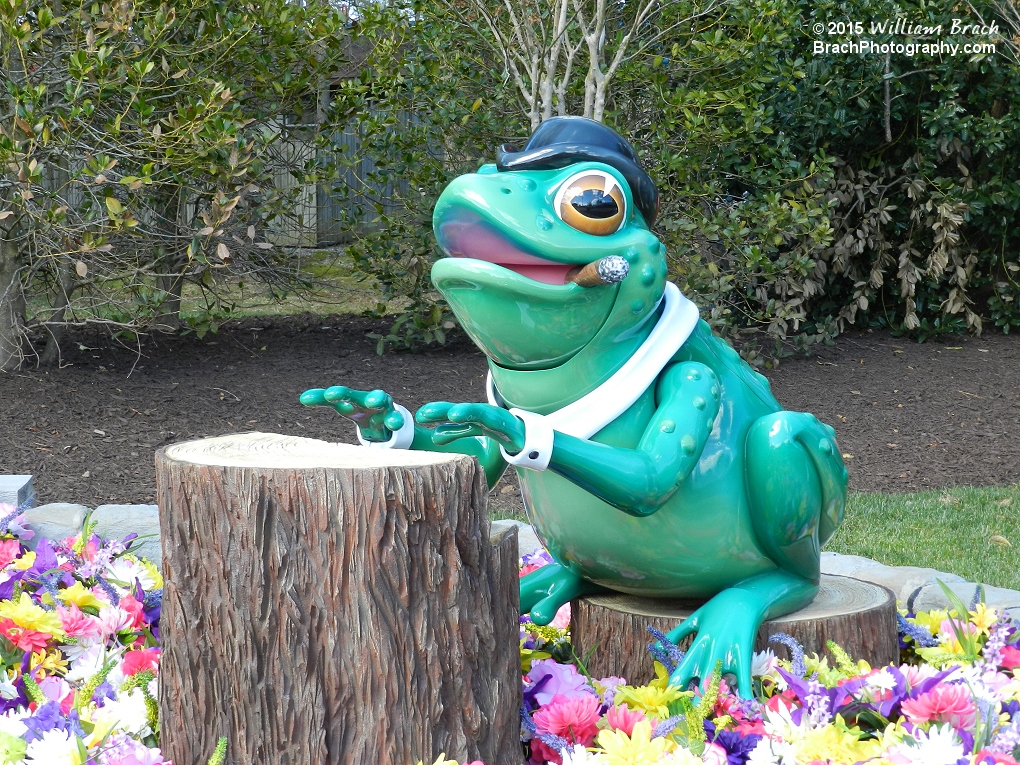 He plays music on his log piano.