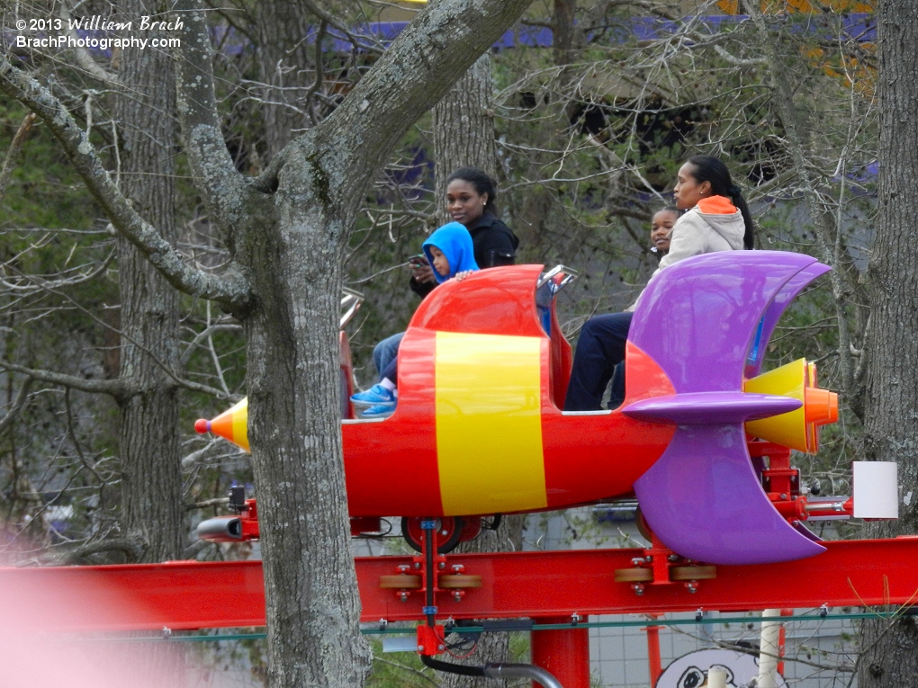 Rocket ship car gliding around the park.