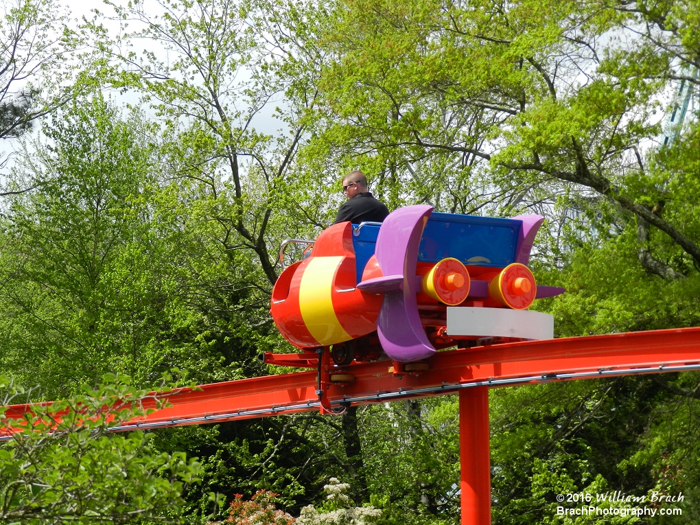 Appears the Rocket Express ride goes into the woods, but not so.