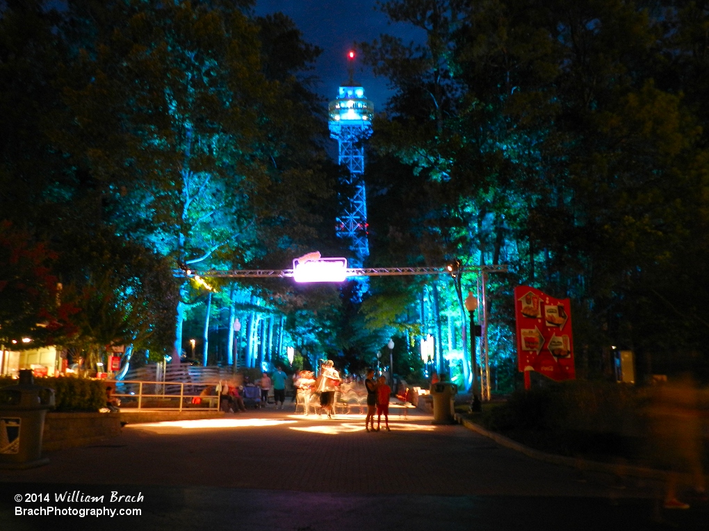 Pathway leading between the Garden Clock and the Eiffel Tower is lit blue.