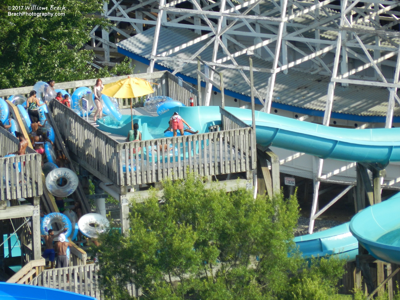 Lifeguard working the slide in Soak City.