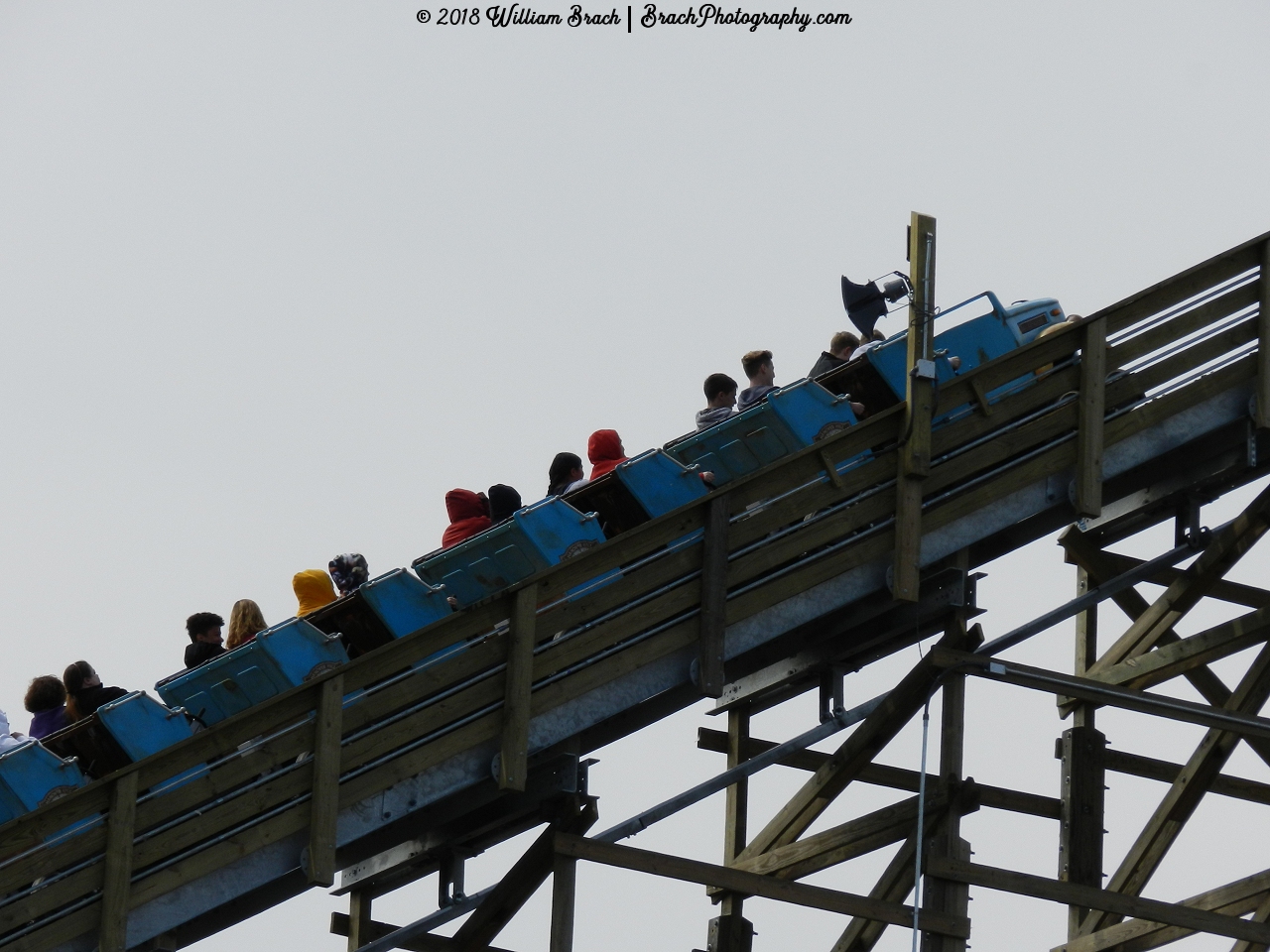 Blue train on the lift hill.