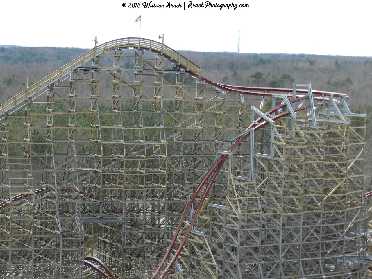 Overview of Twisted Timbers's lift hill and first drop from Americana.