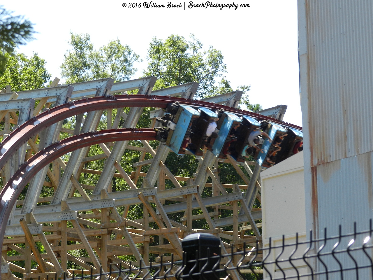 Train going through the first turn after the drop.