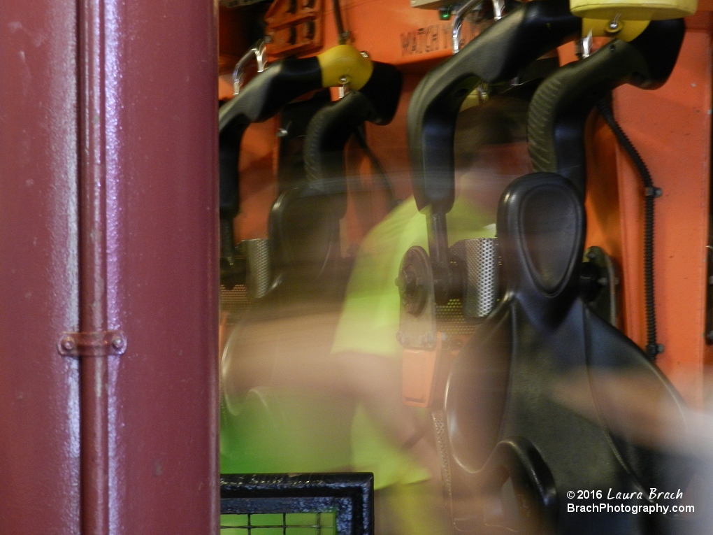 Volcano train in the station and riders quickly boarding.