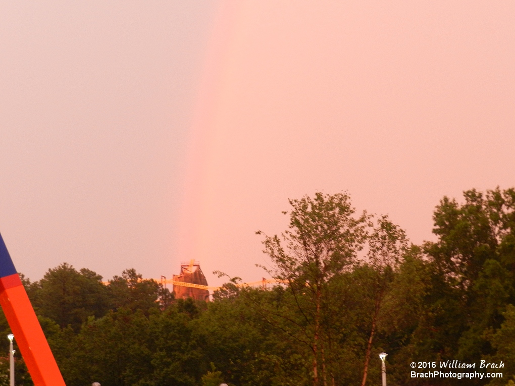 Volcano spewing a rainbow after a lengthy rain delay.