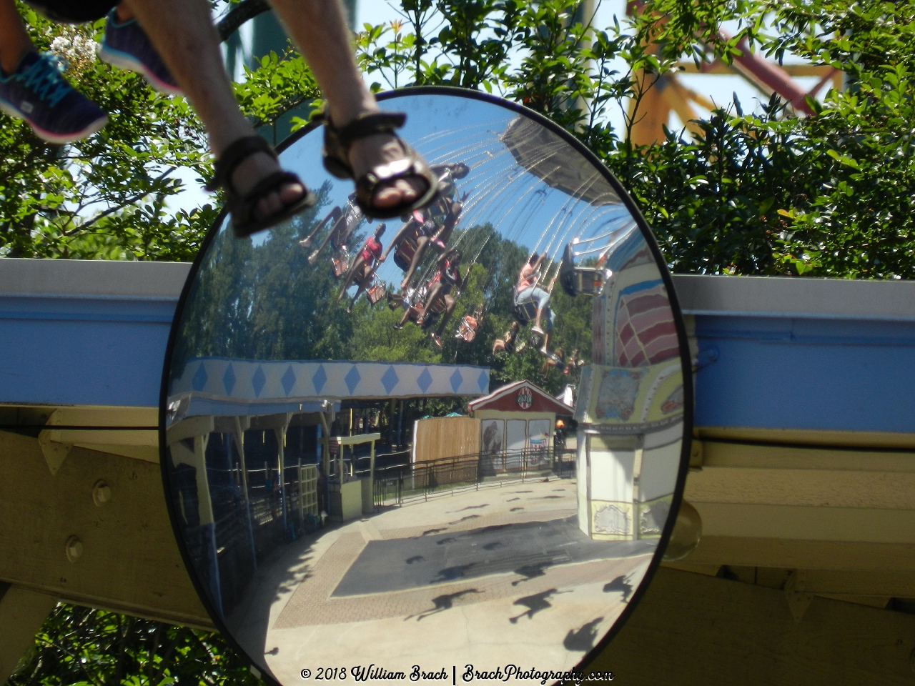 Wave Swinger from the ride op's safety mirror.