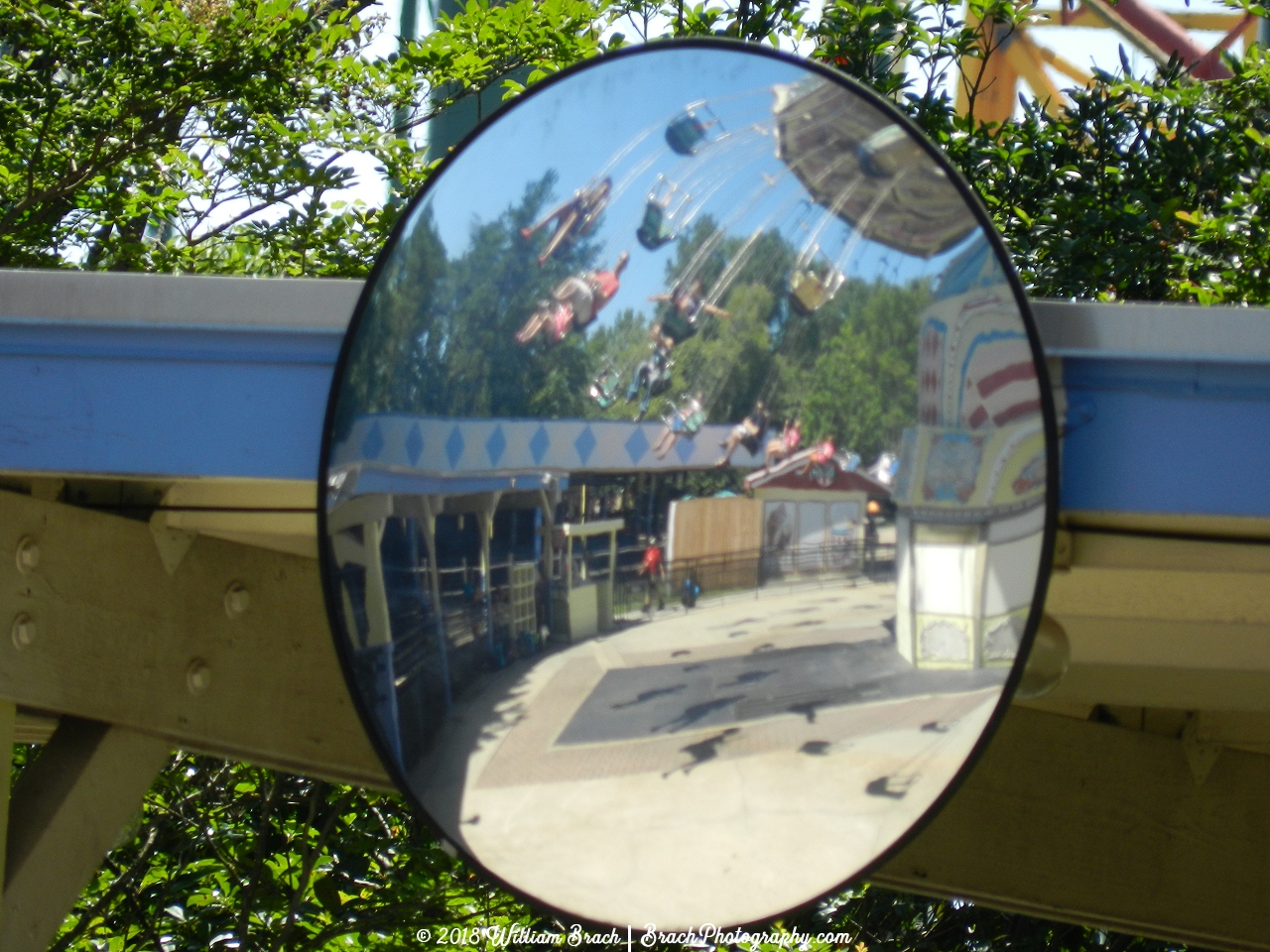 Wave Swinger from the ride op's safety mirror.