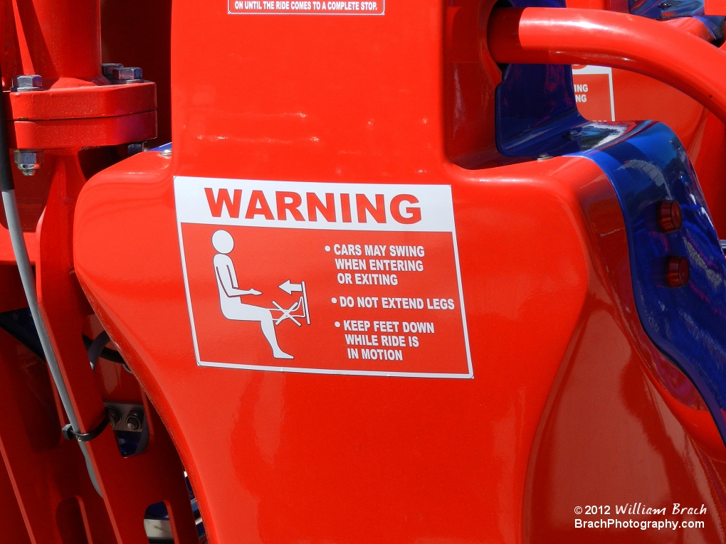 Every ride comes with warnings, this is WindSeeker's warning sign on the backs of every seat.