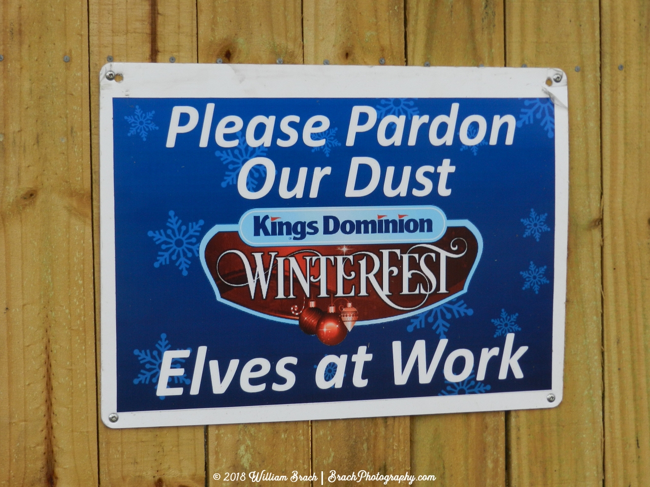 A wall and sign advertising that there will be something here for WinterFest!