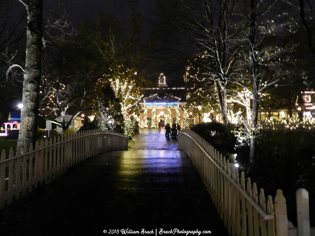 Looking across the bridge from the 12 Days of Christmas ride at the Kings Dominion Theater at the lights decorating the Old Virginia Christmas area.