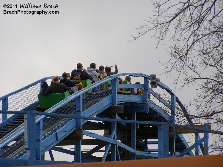 Ghoster Coaster train cresting the lift hill.