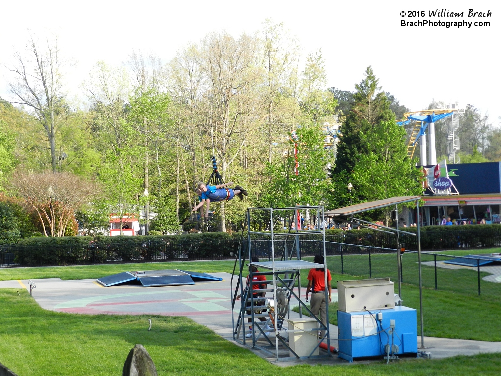 They're slowing down and waiting for the ride op to hand them the brake cable to slow them down over the elevator platform.