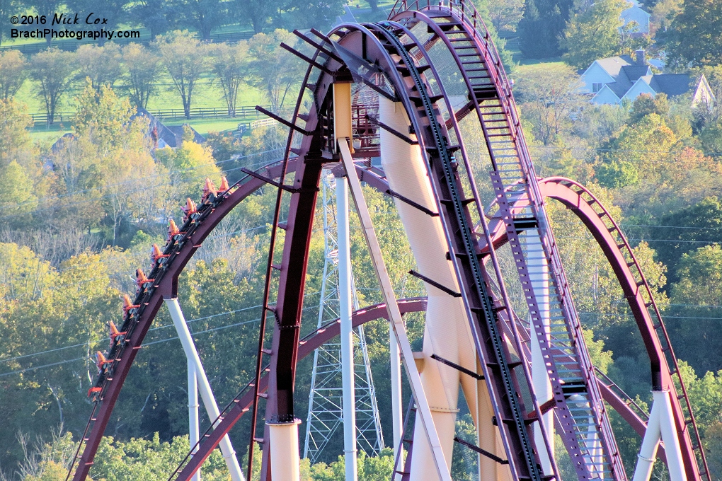 The lift hill with the train flying in the background.