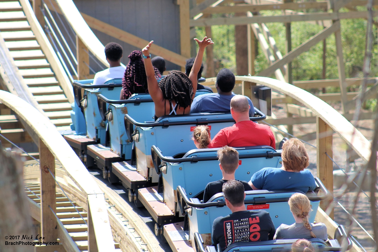 The train about to go over the lift hill.