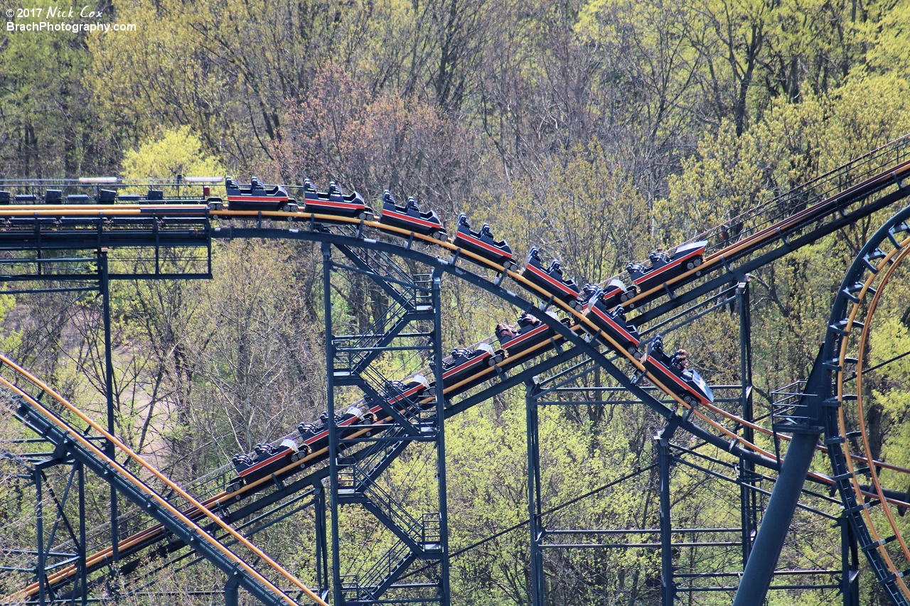 A train on the lift and one leaving the mid course.