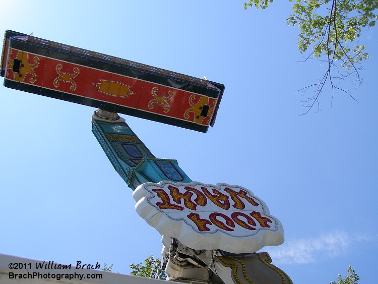 Looking up at the ride's gondola in mid-air.