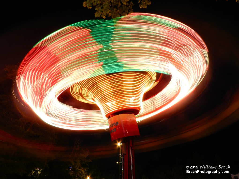 Very nicely lit up Balloon Race in motion at night.