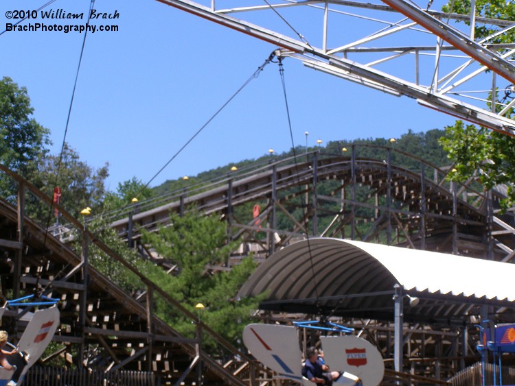 Still Under Construction.  Here we see one of the two lifts and the station while looking through the Flyers ride.