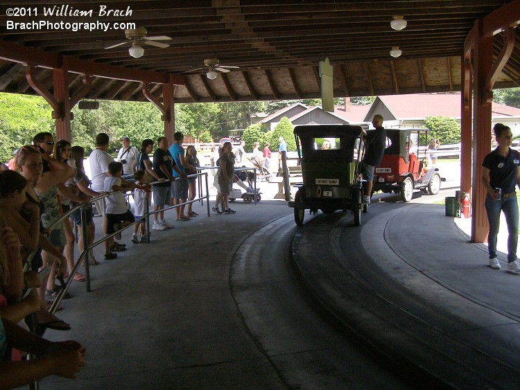 Two more cars in the station.