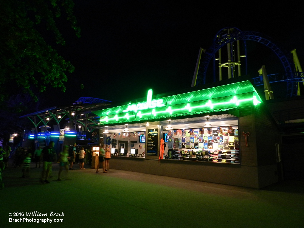 Impulse merchandise shop stand well lit at night.