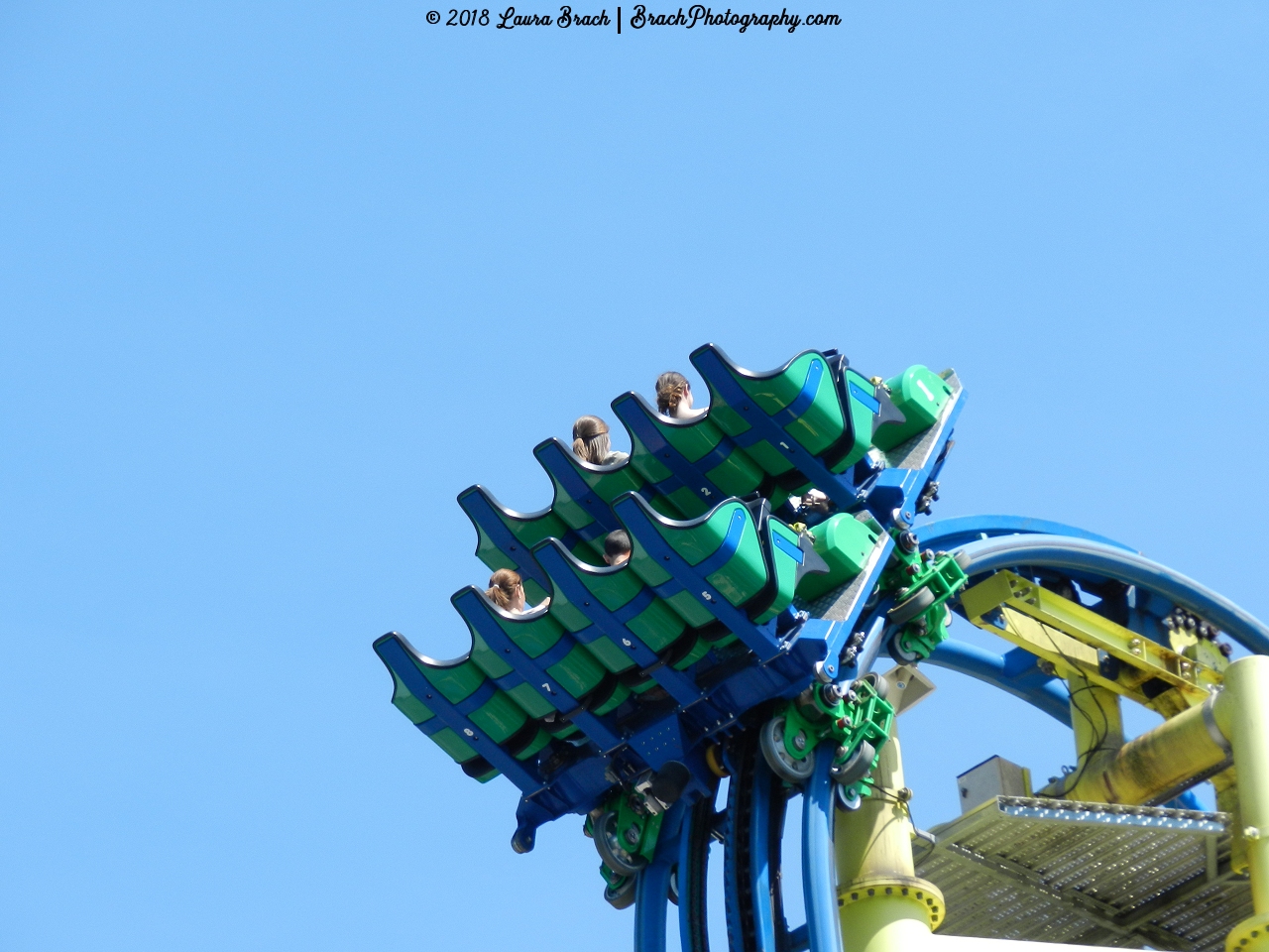 Impulse train cresting the top of the vertical lift hill.