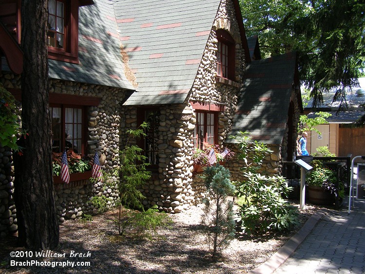 Beautiful cottage building.  A fudge shop is located inside.