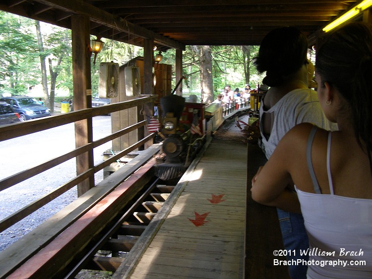 Train is entering the station, but needs to turn around before returning to the station again to change riders.