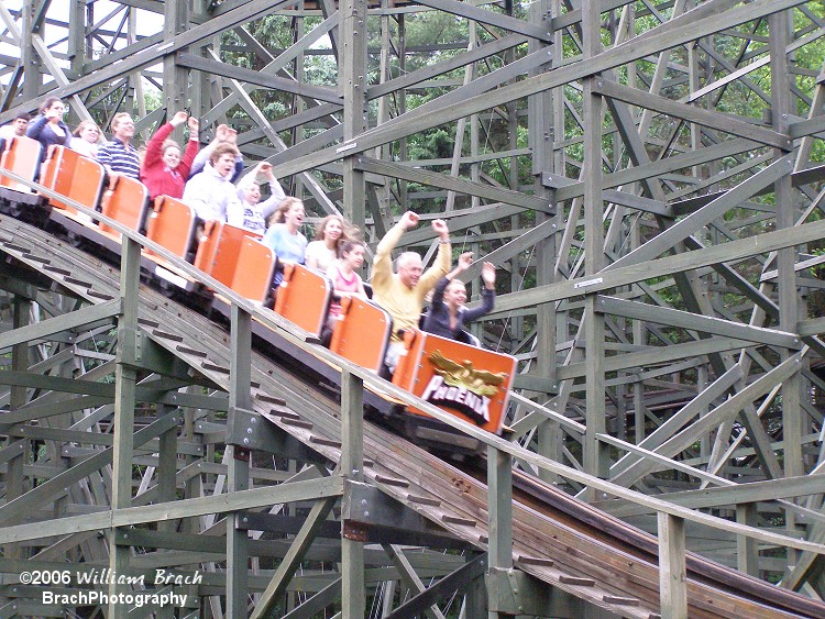 Phoenix orange train running the course at Knoebels.