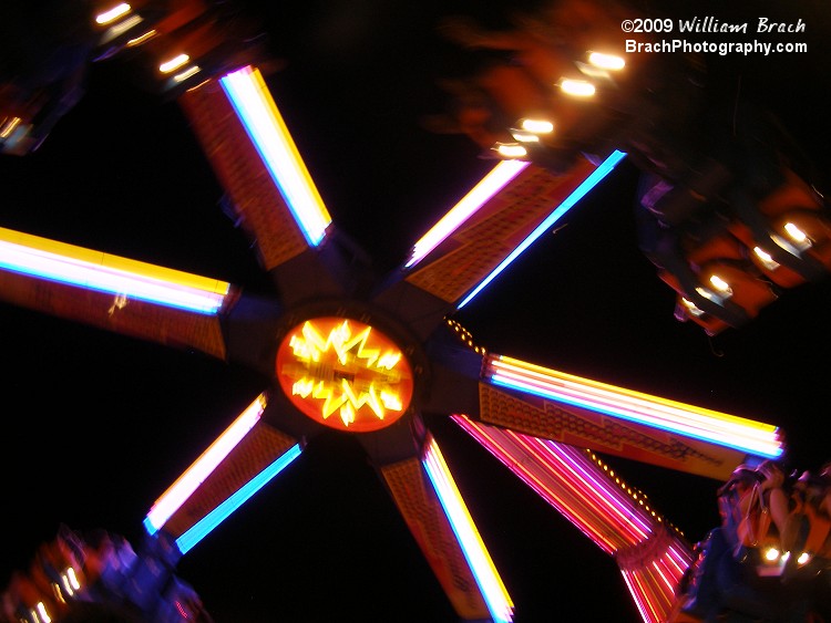 Power Surge at Knoebels in motion lit up at night.