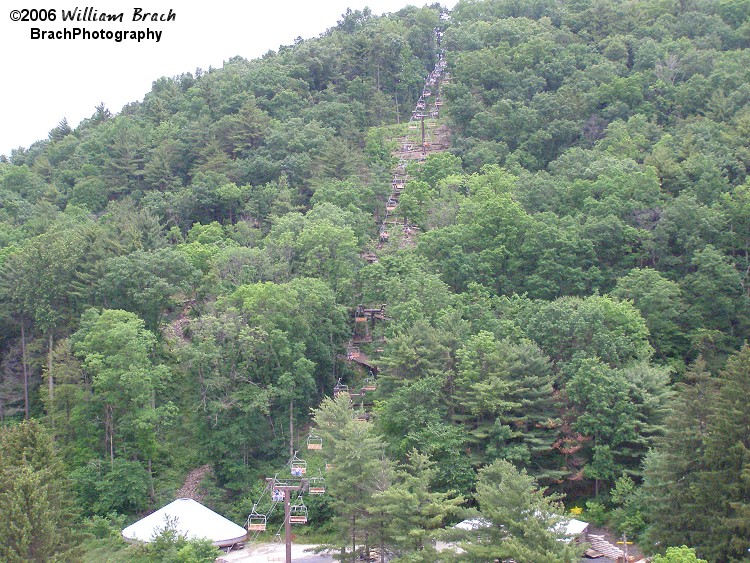 Looking at the hill, you can see the cable cars going up and down the mountain.