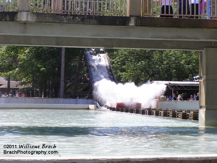 Red boat making its splashdown.  You will get SOAKED on this ride!