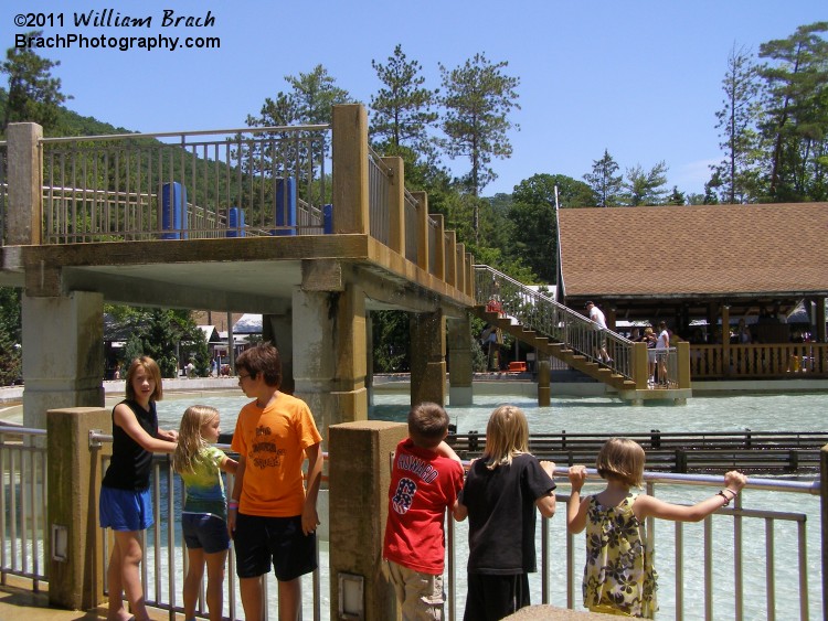 Bridge to stand on and get drenched.  Also used as the ride's exit bridge too.  Good luck getting off that bridge without getting wet all over again.