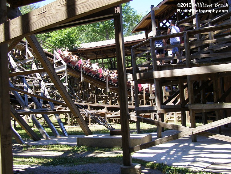 Purple train running the helix on Twister as seen from the Pioneer Train.