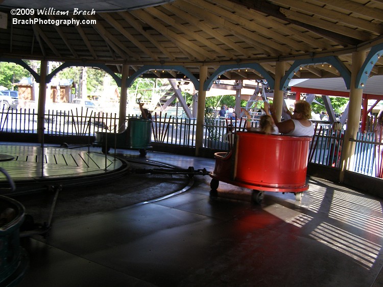 Whipping riders around the oval shaped ride track.