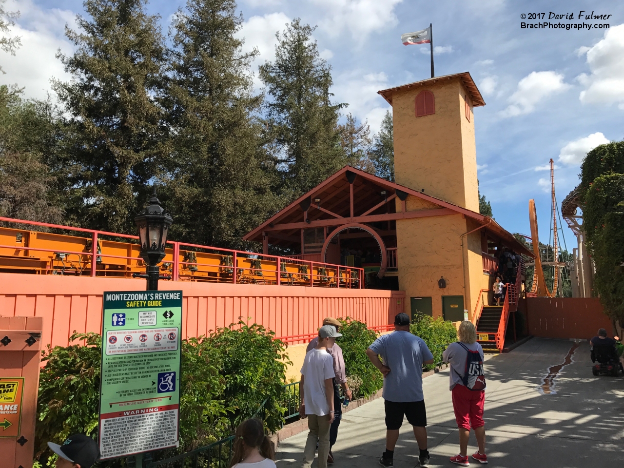 Montezooma's Revenge station building with the vertical loop just beyond the building.