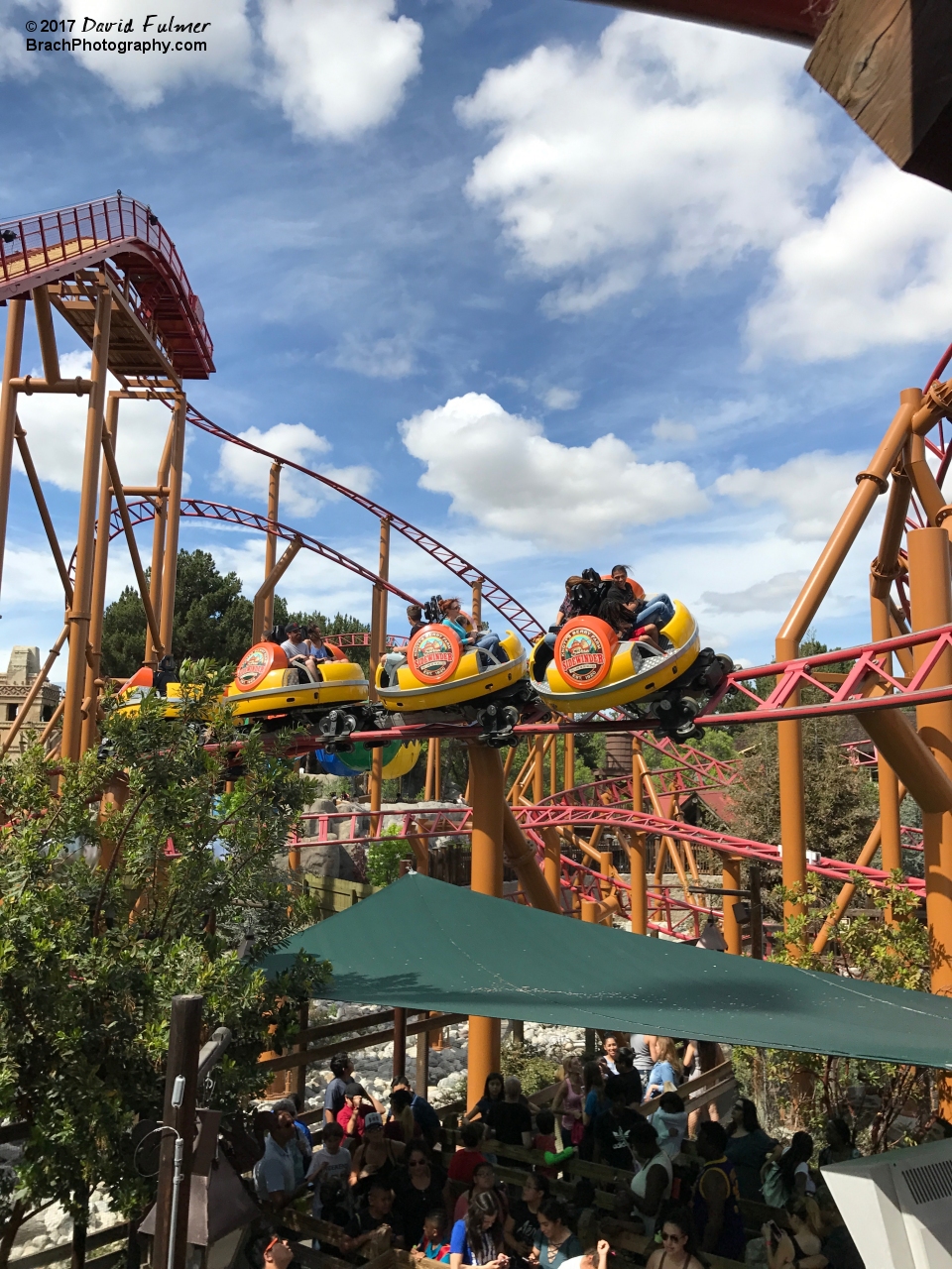 Train going through the course and cars are spinning freely.