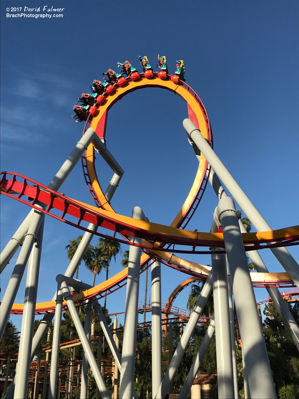 Silver Bullet train going through the vertical loop.