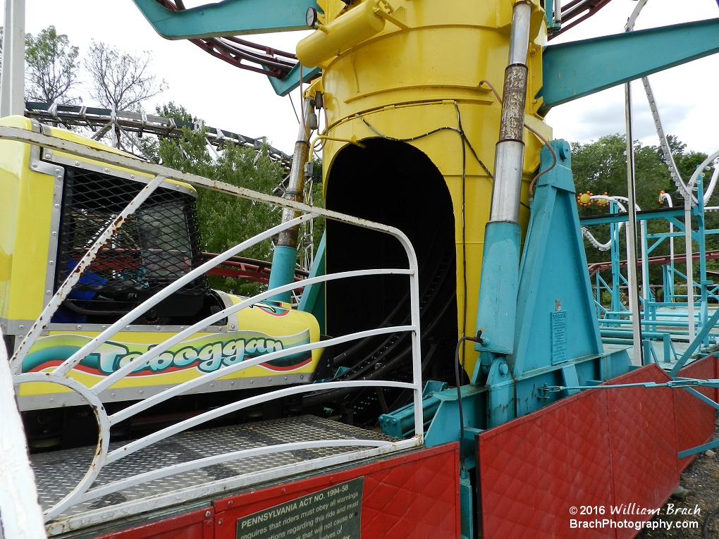 Anticipation builds as the cabin awaits dispatch into the 90-degree lift hill.