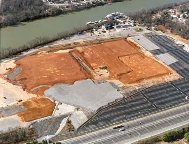 Yet even more dirt in the parking lot.  I think they're having a dirt problem, don't you think so?  (Image generously STOLEN from OpryMills.com back in 2000)