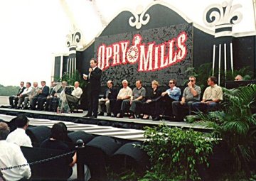 If I were in that crowd, I would have egged each and everyone of those jerks on the stage. (Image generously STOLEN from OpryMills.com back in 2000)