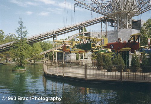 The Barnstormer - Opryland's Bi-Plane ride seen taking off in this photo with Old Mill Scream's lift hill in the background.